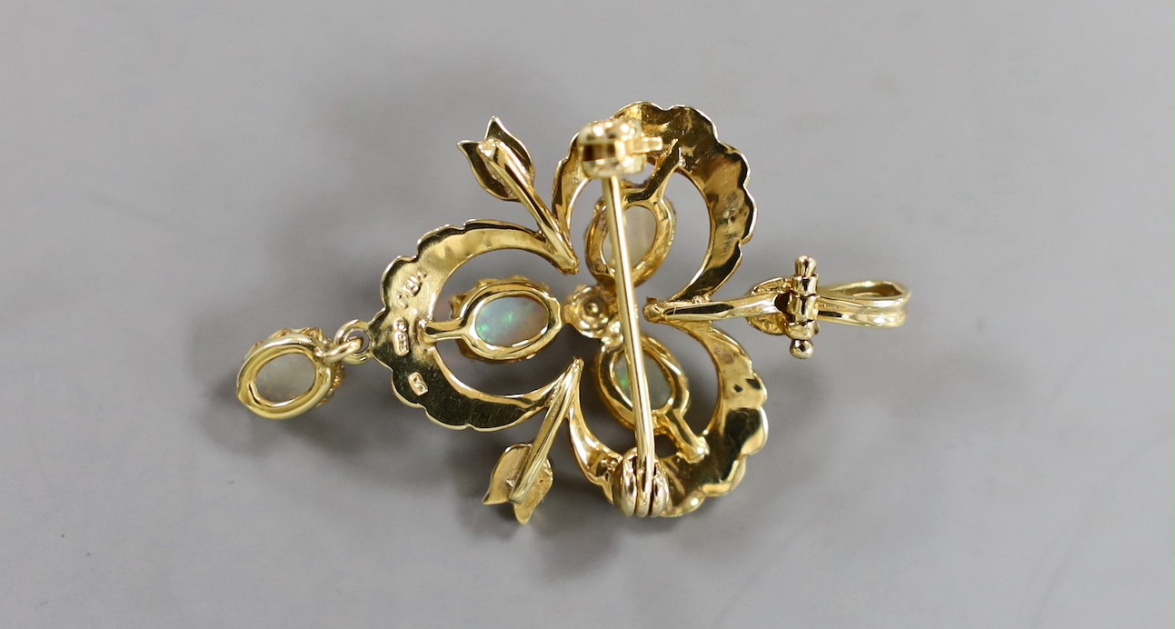 An Edwardian style 9ct gold, white opal and seed pearl set drop pendant brooch, overall 39mm, gross weight 4.9 grams.